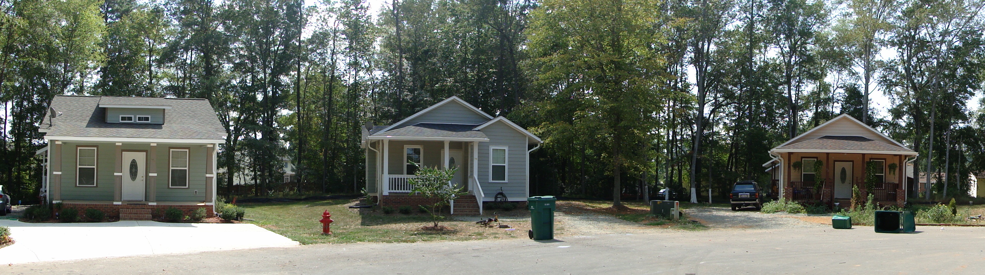 a row of three homes built by Chatham Habitat for Humanity
