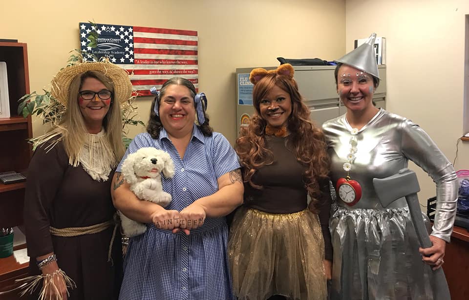 picture of HR staff dressed in wizard of oz costumes