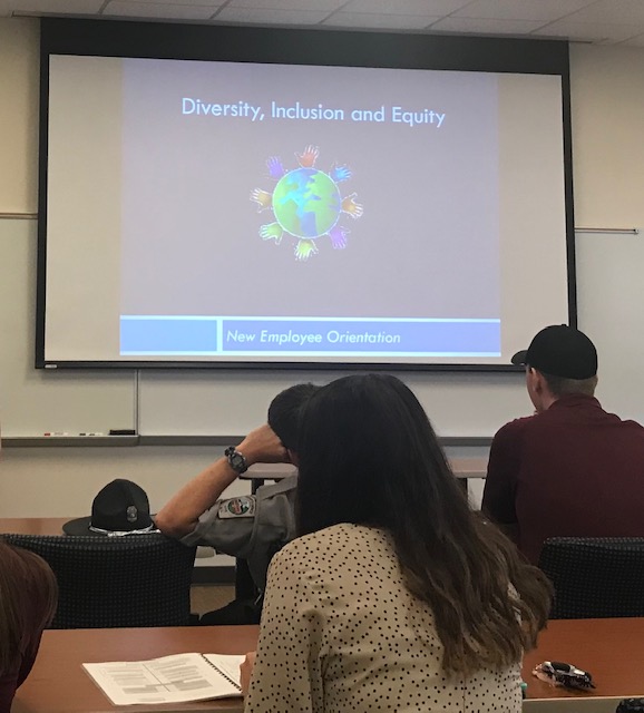 photo of powerpoint from new employee orientation that says diversity, equity and inclusion