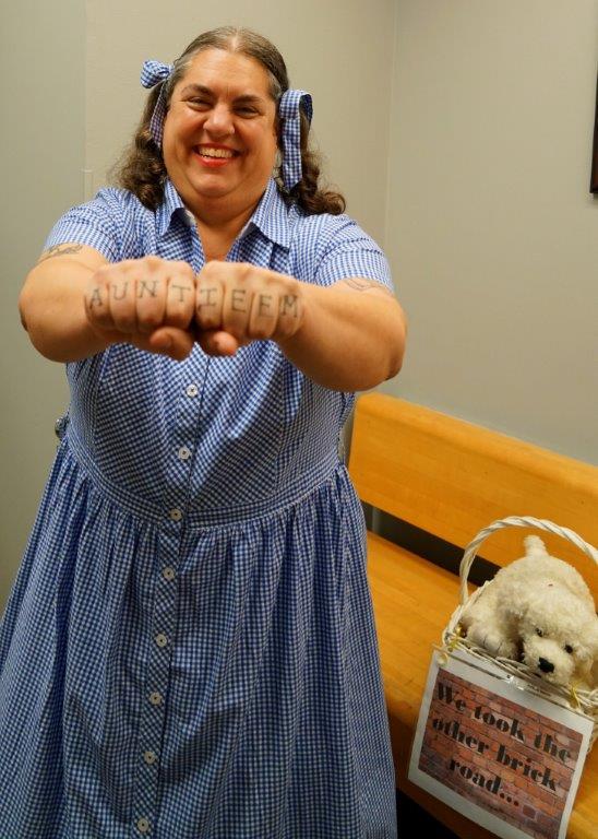 funny photo of HR Director Carolyn Miller dressed as Dorothy for Halloween