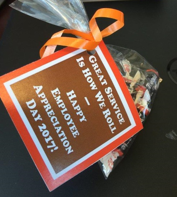 photo of goody bag filled with tootsie rolls for 2017 employee appreciation day that says great serivice is how we roll - happy employee appreciation day 2017!